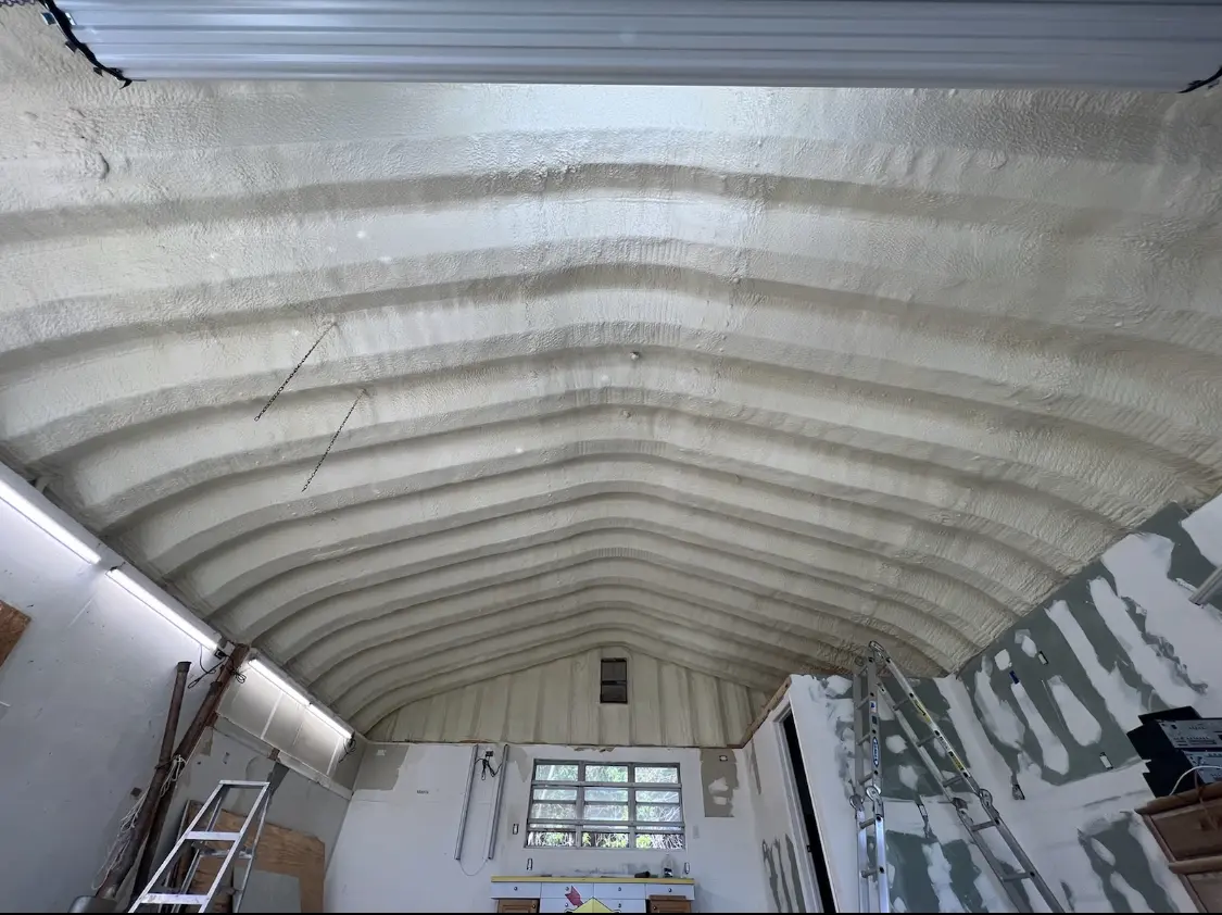 Spray polyurethane foam applied to the underside of a metal roof deck in Washington Court House